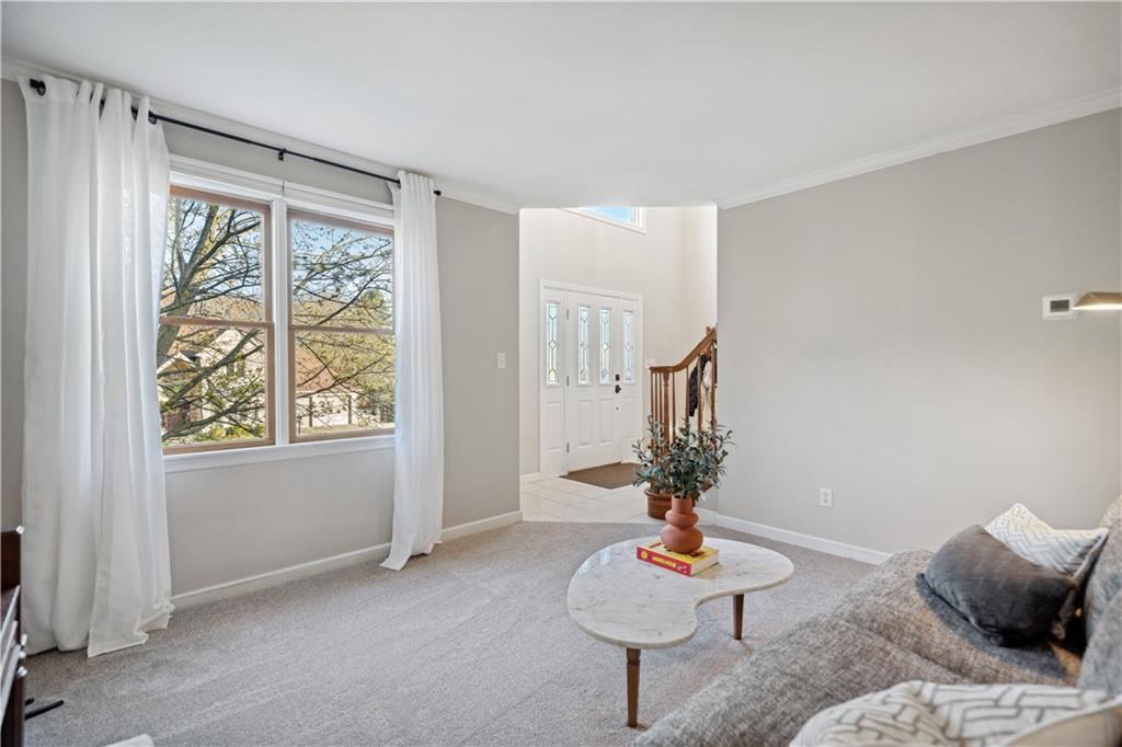 3018 White Pine Drive Gibsonia, PA 15044 - Photo 4 of 38 a living room with furniture and a potted plant