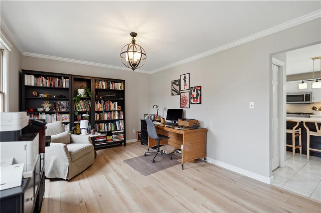 3018 White Pine Drive Gibsonia, PA 15044 - Photo 5 of 38 a view of a livingroom with workspace and a couch