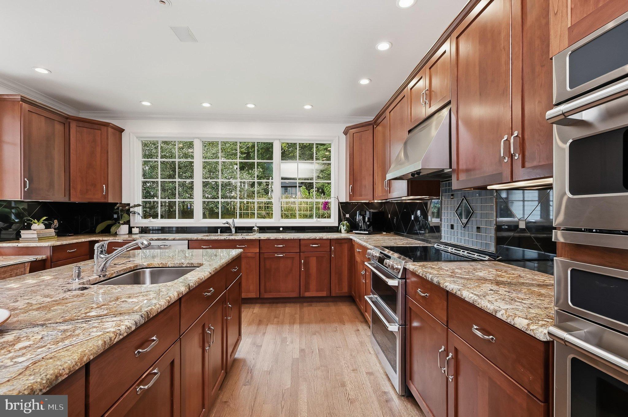 6100 Gloster Road Bethesda, MD 20816 - Photo 13 of 67 Astounding center island kitchen, flooded w
light