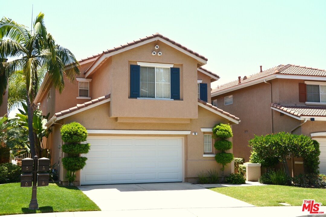 16 Nebraska Irvine, CA 92606 - Photo 2 of 18 a front view of a house with a yard