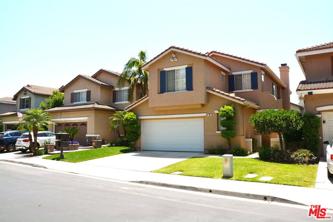 16 Nebraska Irvine, CA 92606 - Photo 7 of 18 a front view of house with garage and yard