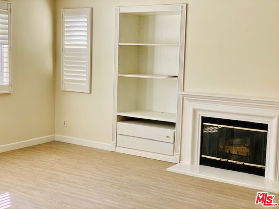 16 Nebraska Irvine, CA 92606 - Photo 8 of 18 a living room with a fireplace