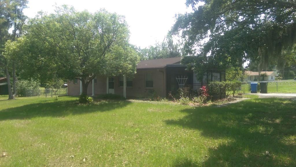 14027 Haynes Road Dover, FL 33527 - Photo 1 of 1 Front & Side of home