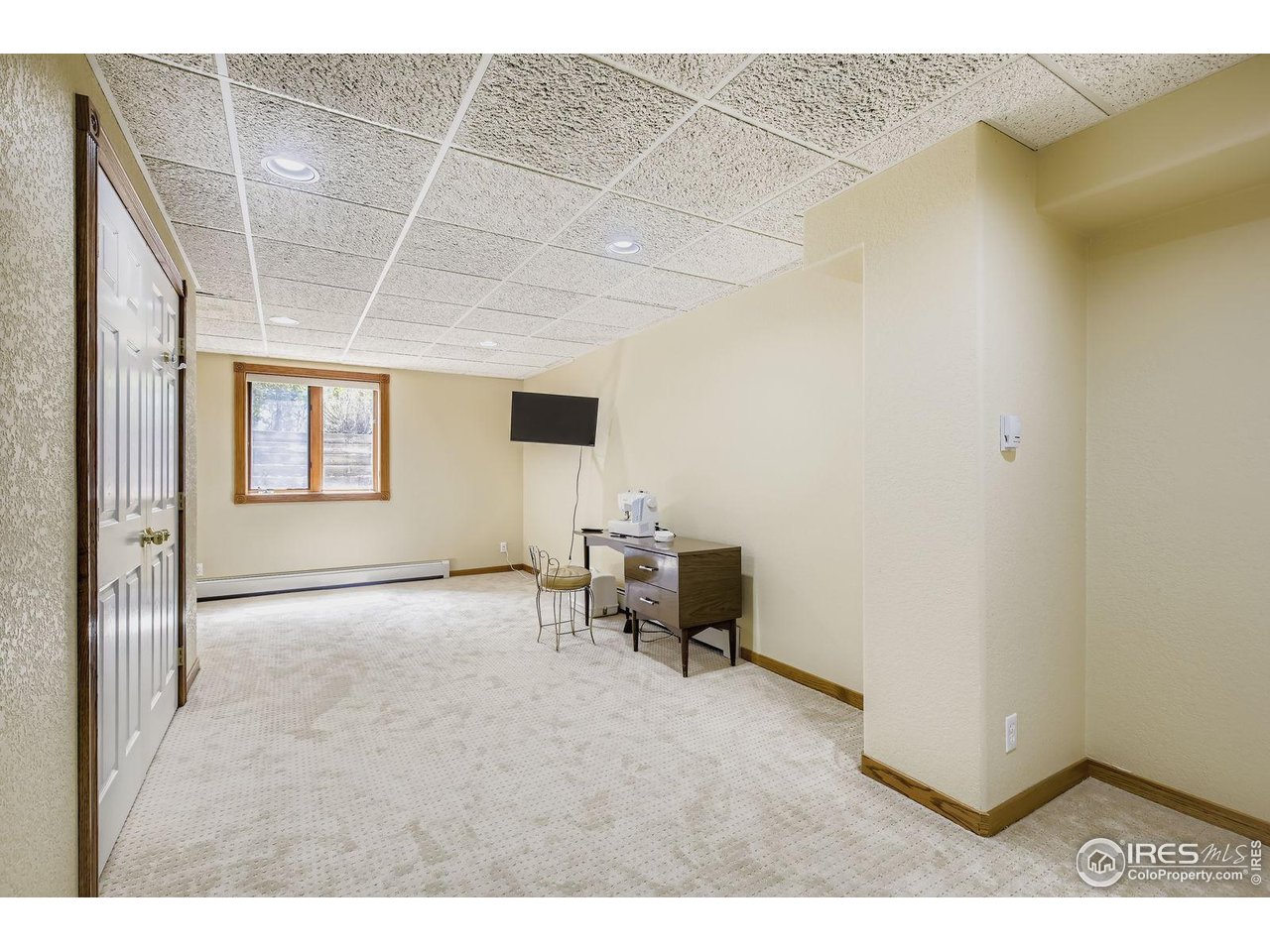 115 Grand View Drive Mead, CO 80651 - Photo 27 of 45 Basement bedroom