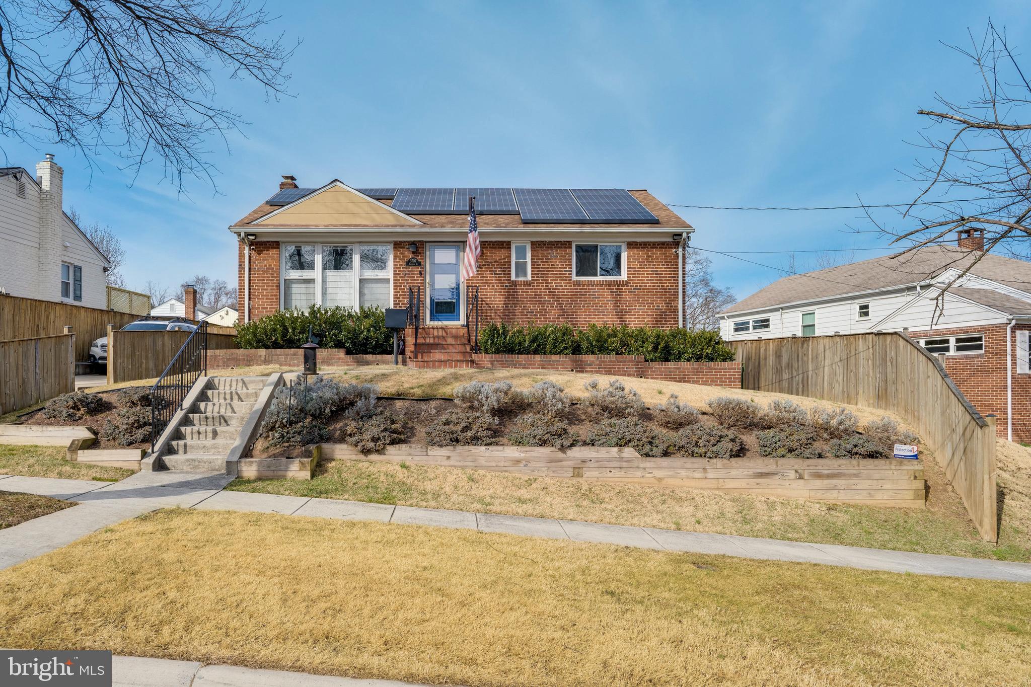 3707 Everton Street Silver Spring, MD 20906 - Photo 2 of 52 a front view of a house with a yard