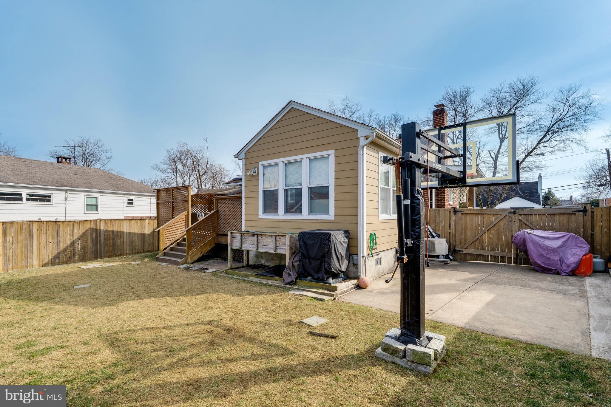 3707 Everton Street Silver Spring, MD 20906 - Photo 48 of 52 a front view of a house with a yard outdoor seating and covered with green space