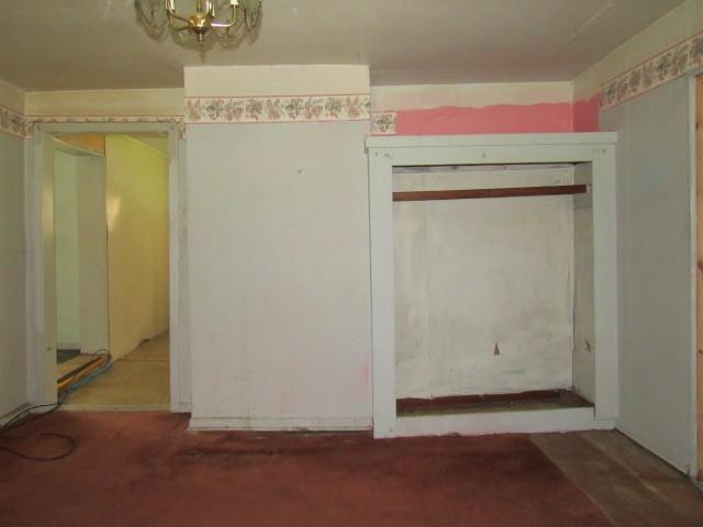 428 Grindstone Road Grindstone, PA 15442 - Photo 9 of 15 a room with a door and wooden door