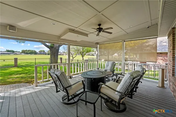 a view of a patio with furniture