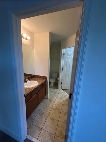 a view of livingroom with washer and dryer