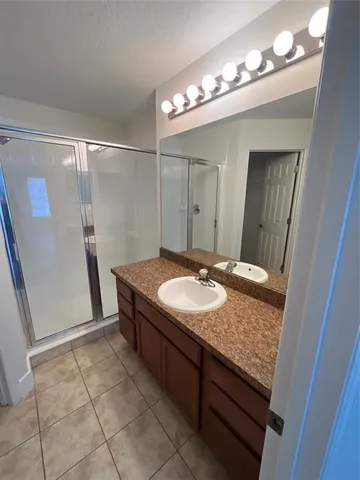 a bathroom with a sink and toilet