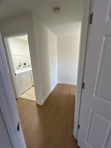 a bathroom with a tub and shower