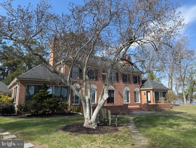 14135 Cooley Road Princess Anne, MD 21853 - Photo 3 of 15 a front view of a house with a yard