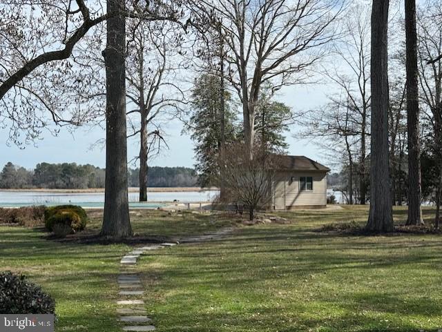 14135 Cooley Road Princess Anne, MD 21853 - Photo 8 of 15 a view of a fountain in the middle of a lake