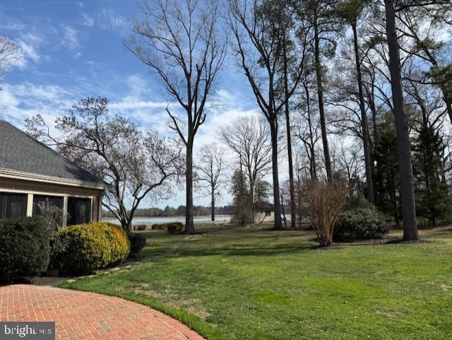 14135 Cooley Road Princess Anne, MD 21853 - Photo 9 of 15 a view of a house with a backyard