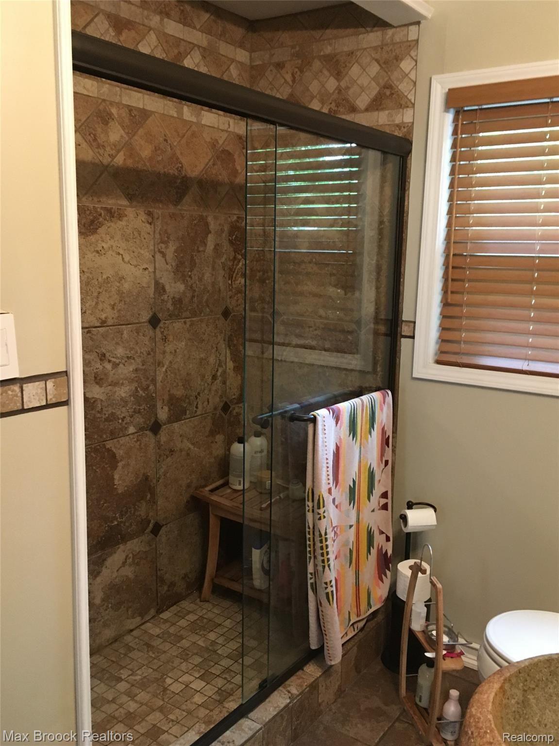 22725 Power Road Farmington, MI 48336 - Photo 17 of 25 Beautifully updated Shower in Hall Bath