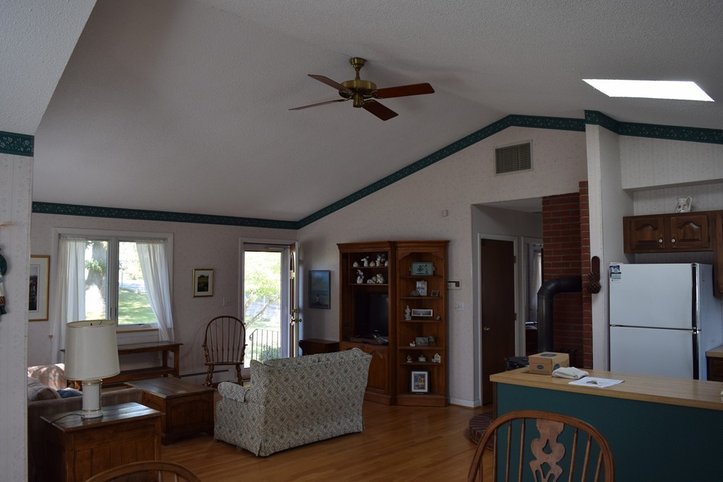 381 Albert Street Fall River, MA 02721 - Photo 15 of 21 a living room with furniture and a wooden floor