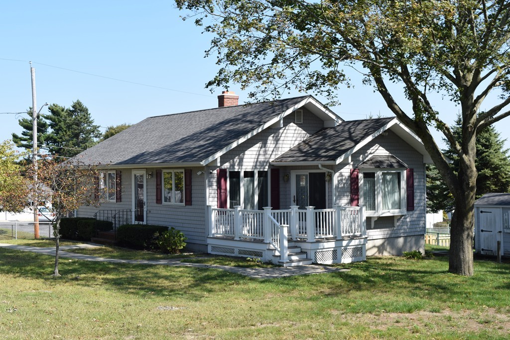 381 Albert Street Fall River, MA 02721 - Photo 2 of 21 a front view of house with yard porch and tree