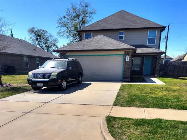 a car parked in front of a house