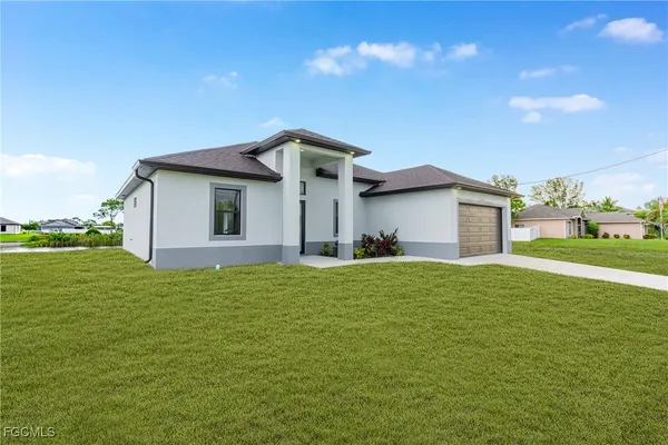 a house view with a garden space