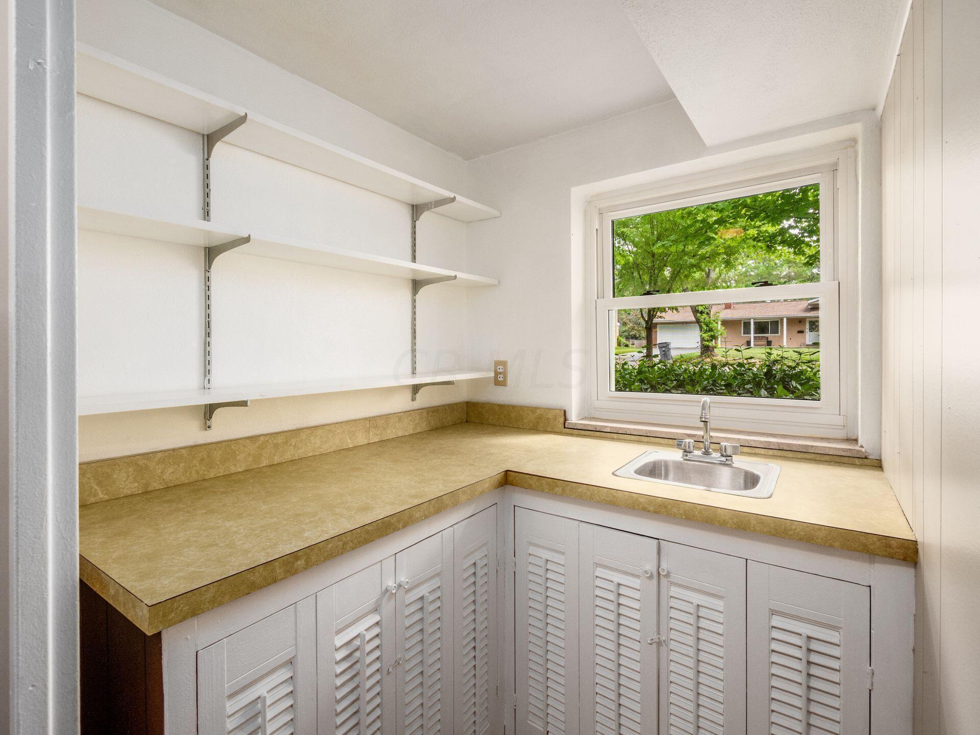 2835 Halstead Road Upper Arlington, OH 43221 - Photo 13 of 30 This space could easily be converted to a shower making the neighboring half bath full!