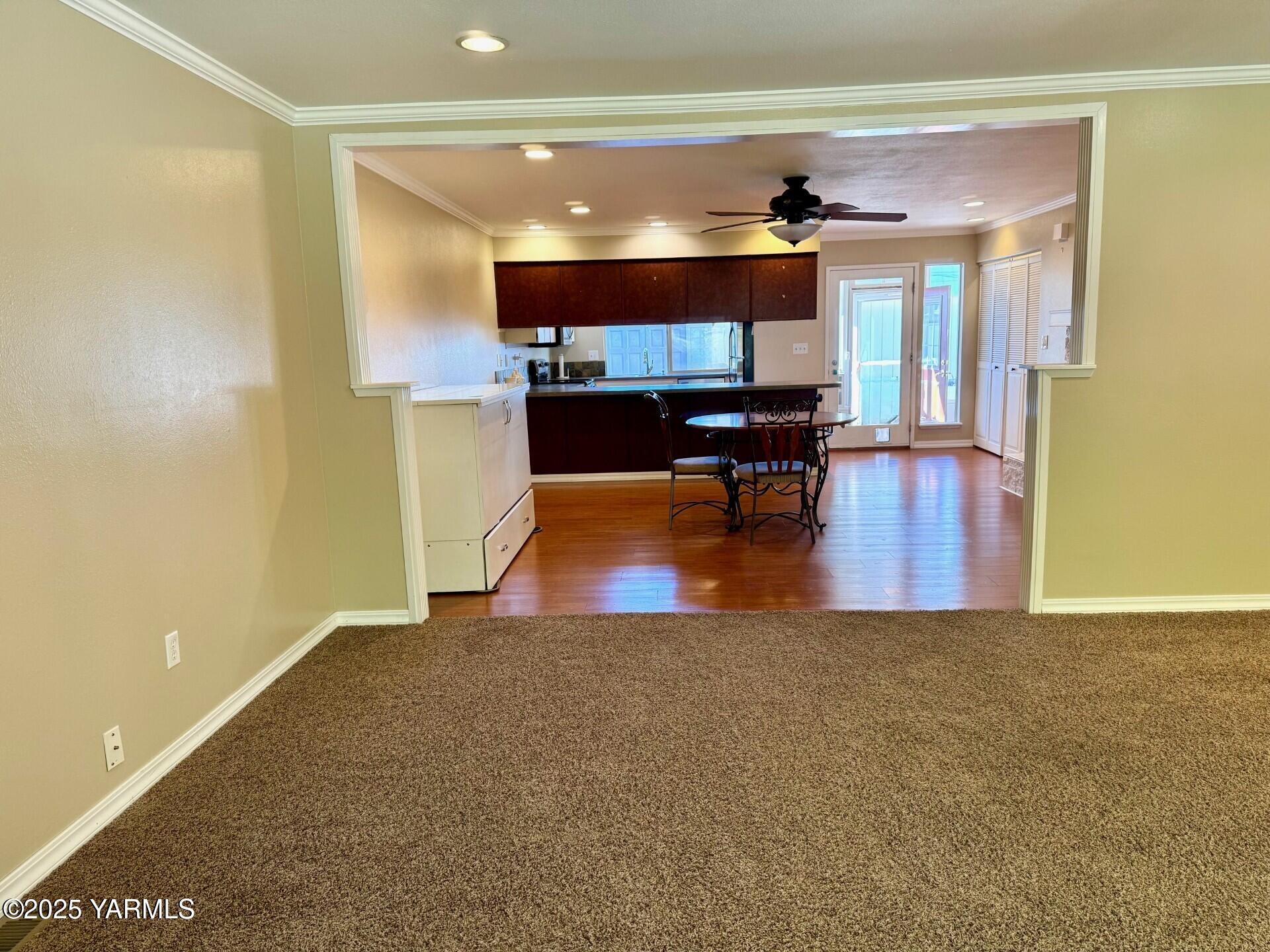 215 North 56th Avenue, Unit 5 Yakima, WA 98908 - Photo 14 of 31 a view of kitchen with furniture and a window