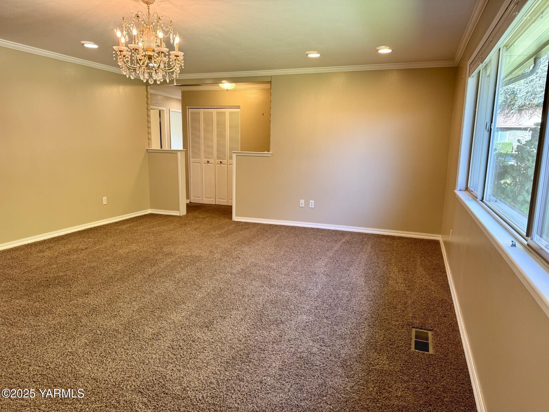 215 North 56th Avenue, Unit 5 Yakima, WA 98908 - Photo 10 of 31 en view of an empty room with a window