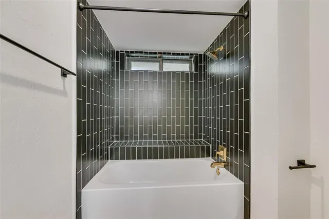 a bathroom with a bathtub