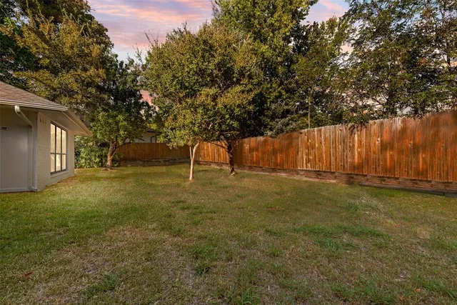 a view of garden with patio