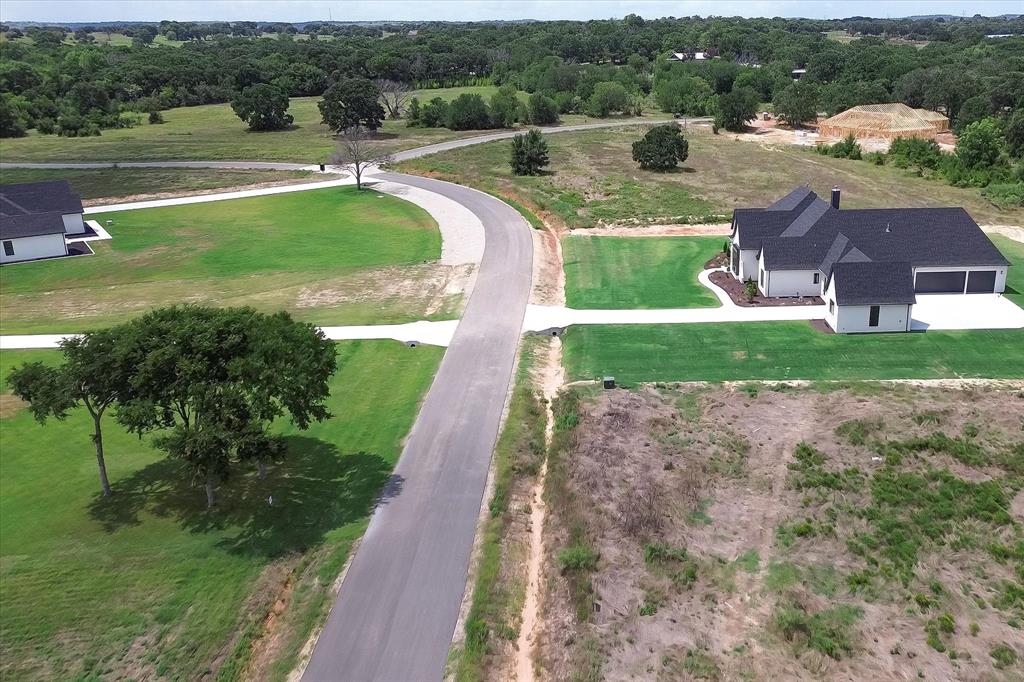 2001 Meadow Bend Aledo, TX 76008 - Photo 11 of 12 a view of a lake with a yard