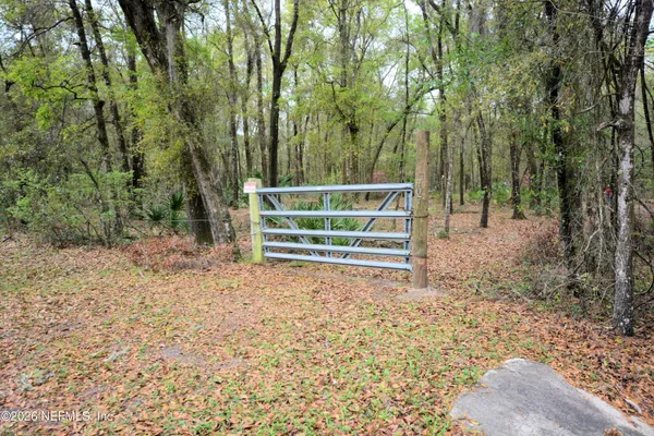 a view of a wooden fence