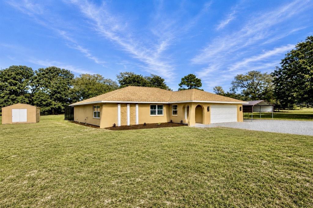 9086 Grove Road Brooksville, FL 34613 - Photo 1 of 30