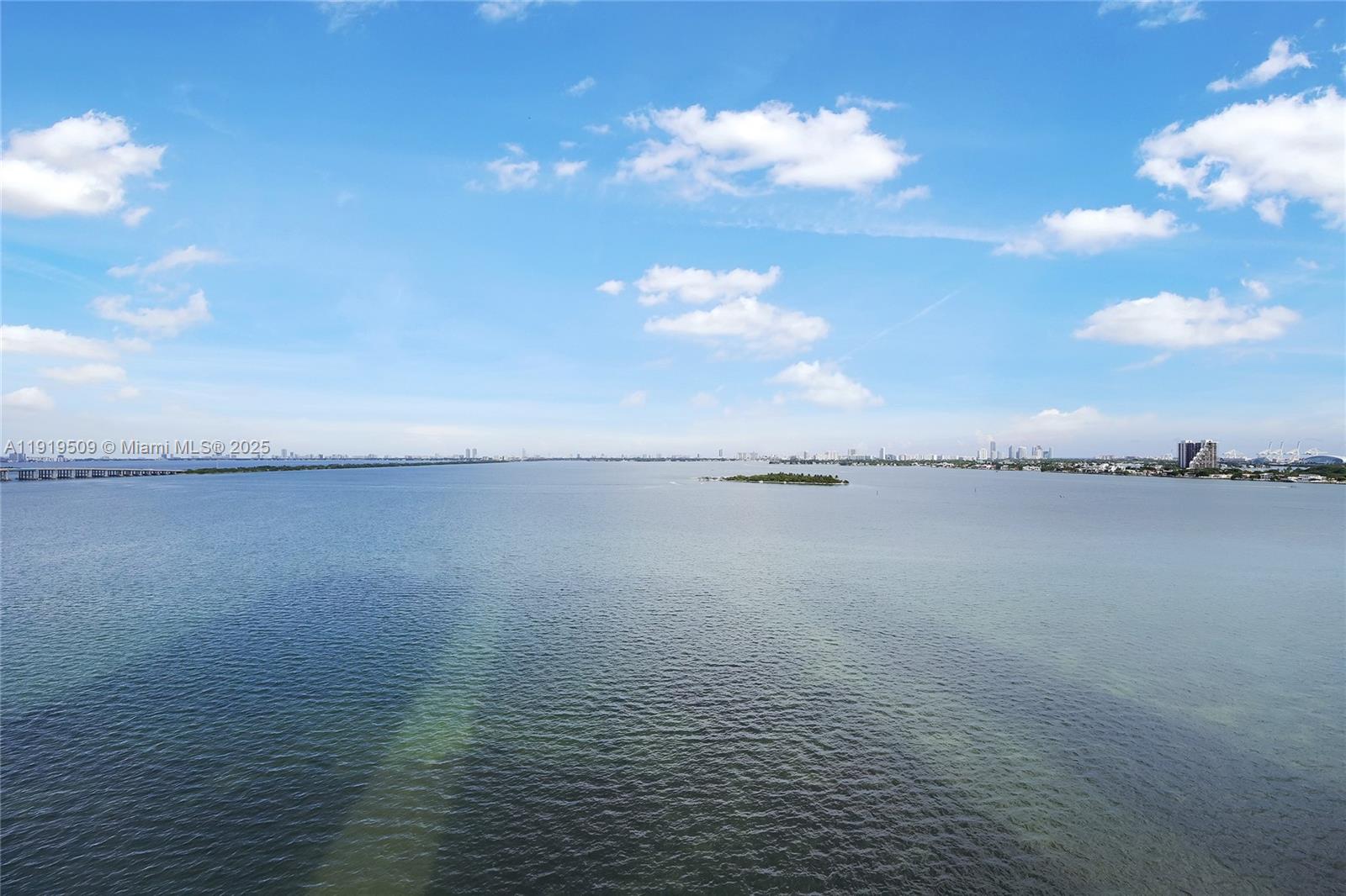 a view of a lake and mountain in the back