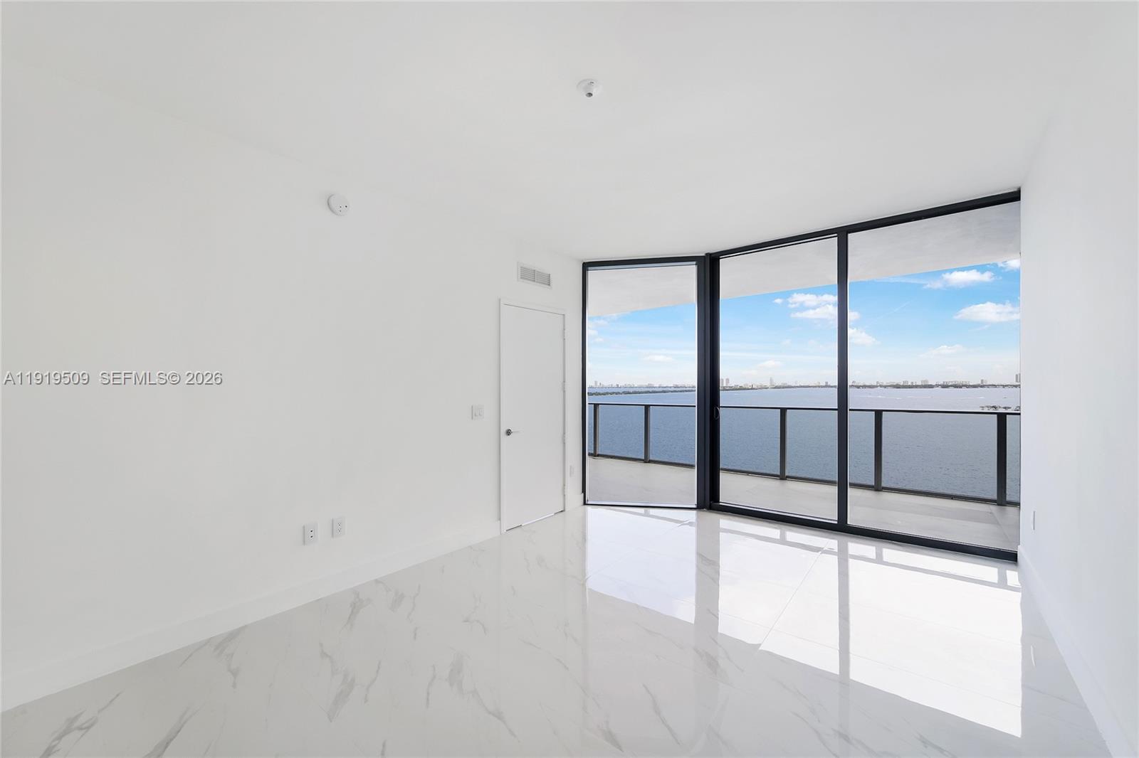 700 Northeast 24th Street, Unit 1101 Miami, FL 33137 - Photo 16 of 66 a view of an empty room with a window