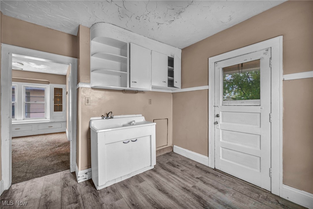 949 Rudyard Road Cleveland, OH 44110 - Photo 14 of 42 Washroom featuring light wood-style floors