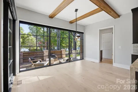 a view of an entryway with floor to ceiling window