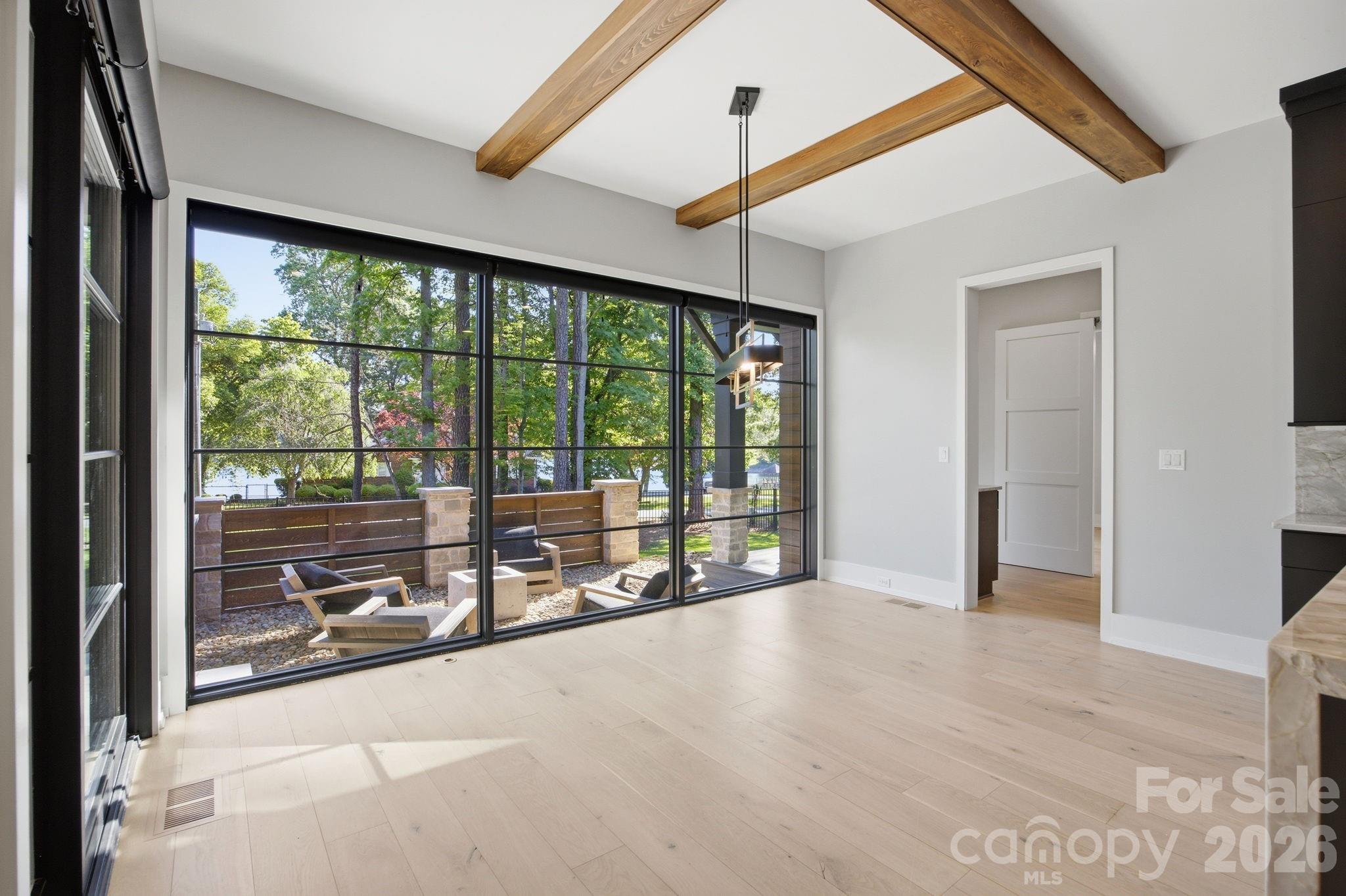 132 Binns Road Mooresville, NC 28117 - Photo 12 of 48 a view of an entryway with floor to ceiling window