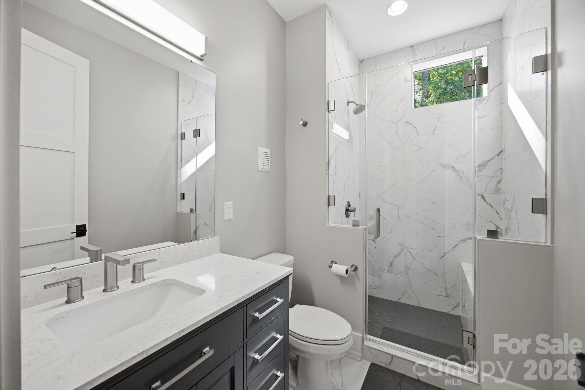 132 Binns Road Mooresville, NC 28117 - Photo 20 of 48 a bathroom with a sink toilet and shower