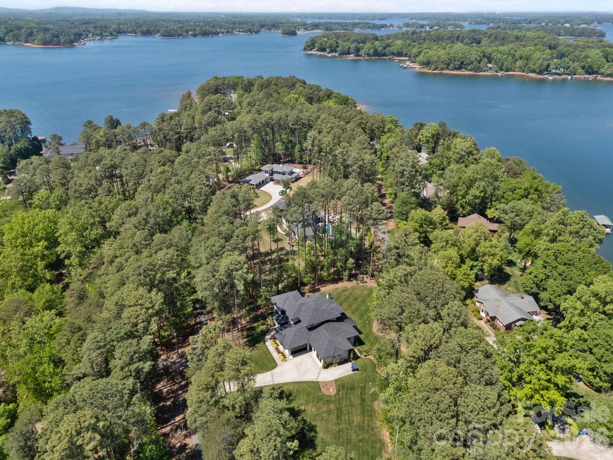 132 Binns Road Mooresville, NC 28117 - Photo 38 of 48 an aerial view of a house with a lake view