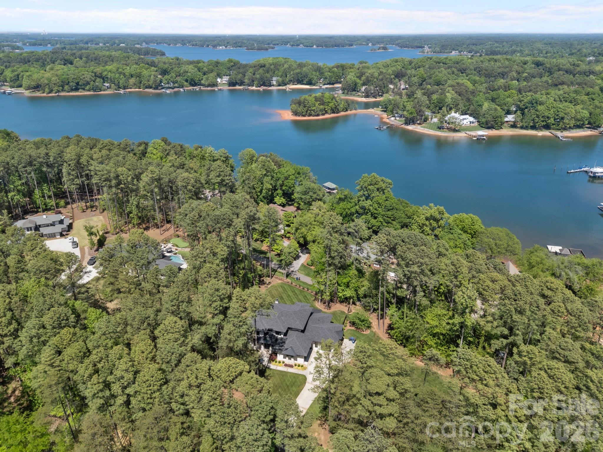 132 Binns Road Mooresville, NC 28117 - Photo 39 of 48 an aerial view of a houses with a lake view