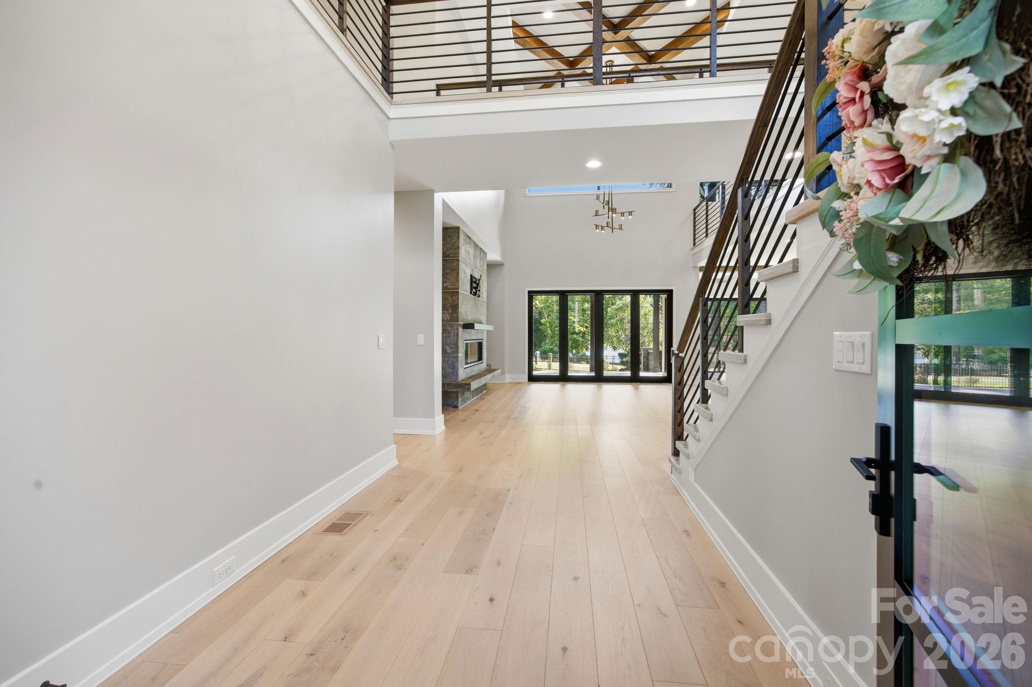 132 Binns Road Mooresville, NC 28117 - Photo 4 of 48 a view of entryway with wooden floor