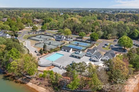 an aerial view of a swimming pool and mountain view