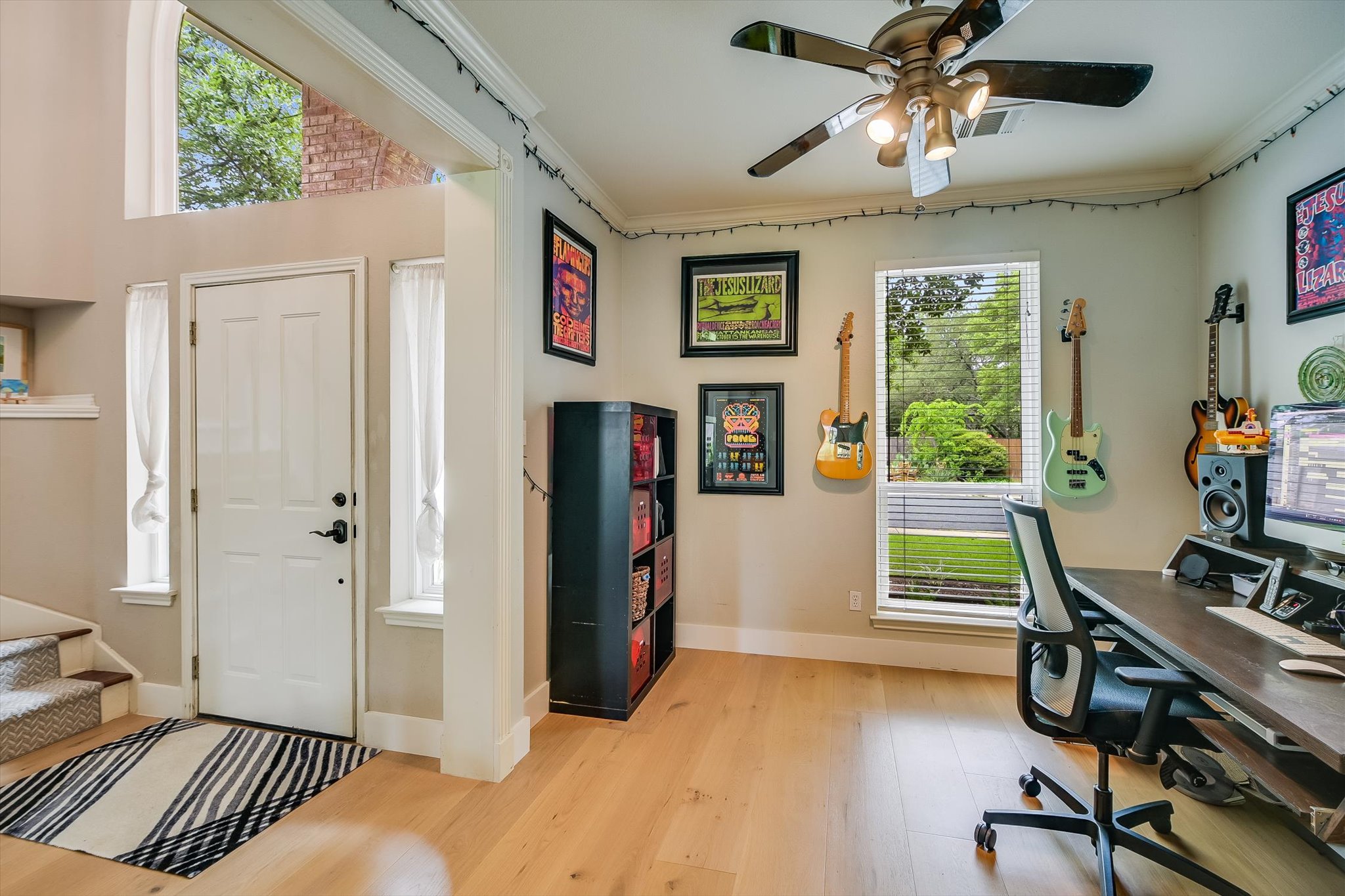 6456 Ruxton Lane Austin, TX 78749 - Photo 4 of 30 A well-lit entry and study with hardwood floors and abundant natural light.