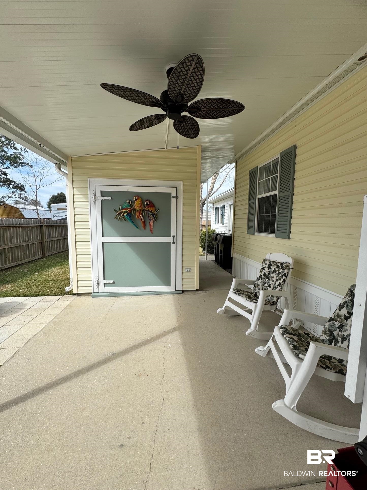 1165 Santa Anna Lane Lillian, AL 36549 - Photo 22 of 43 View of patio with ceiling fan and fence