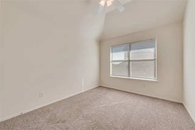 a large bathroom with a large mirror vanity and shower