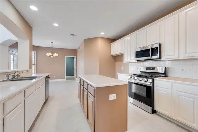 a view of backyard with seating area and green space