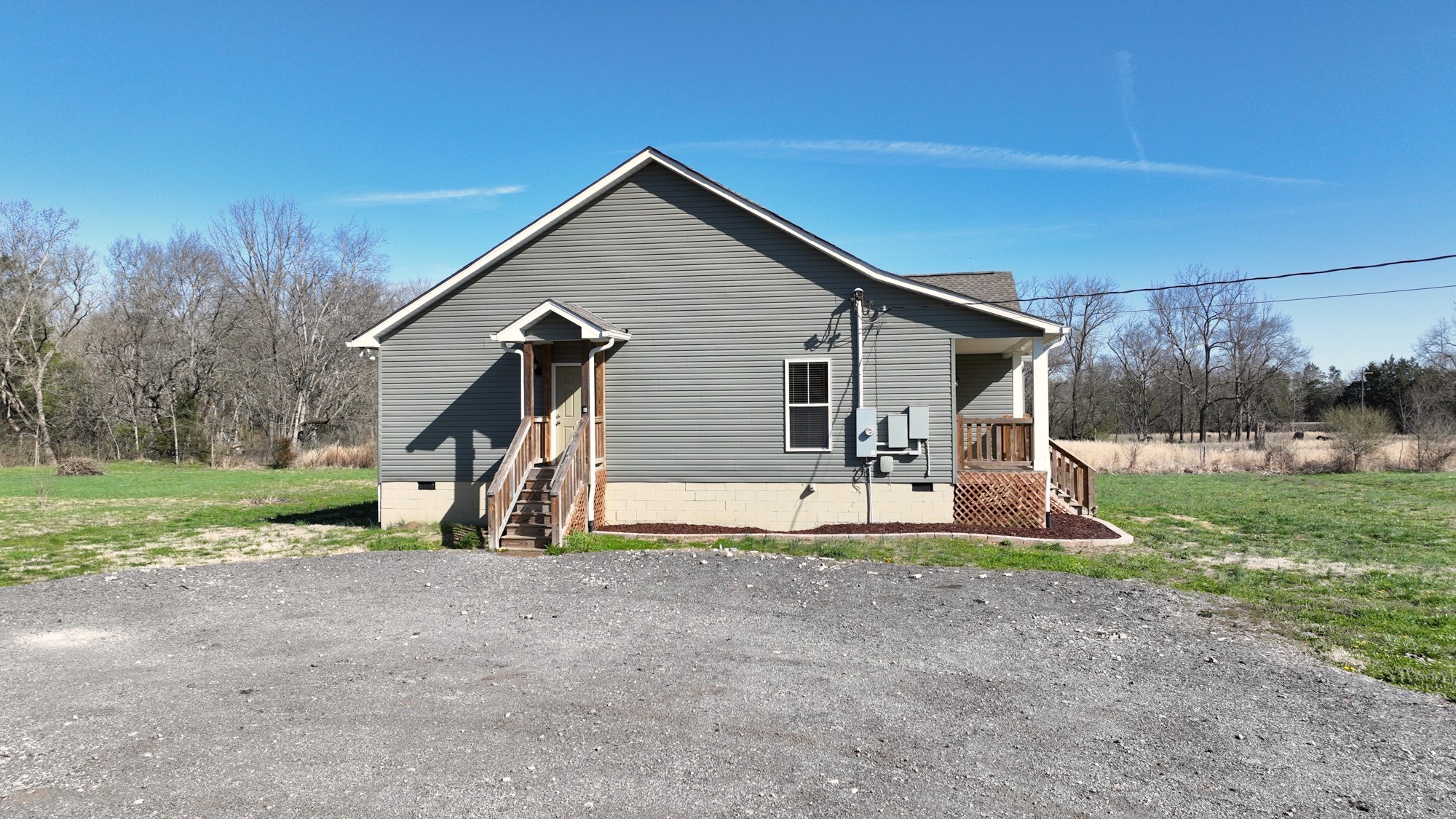 6952 Cainsville Road Lebanon, TN 37090 - Photo 38 of 48 a view of a house with backyard