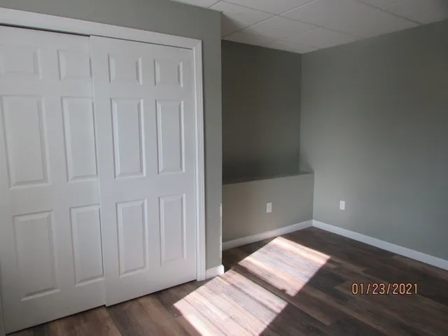 a view of an empty room and window