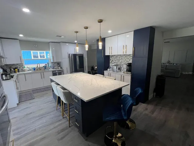 a view of an empty room with a bathroom