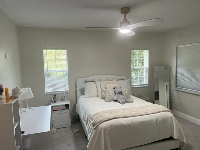 a view of a backyard of a house