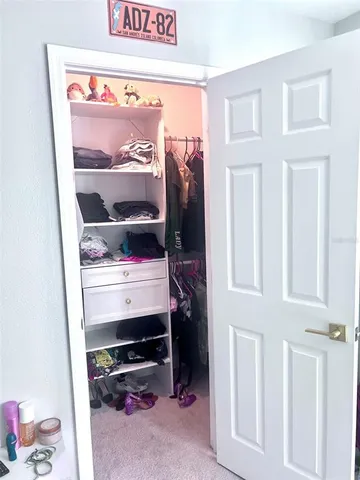 an empty room with windows and windows